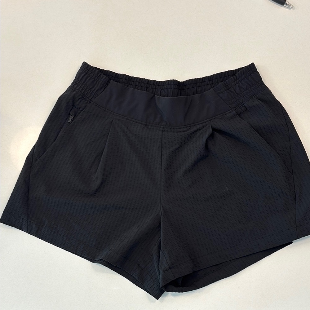 Athleta Brooklyn style black seersucker shorts.